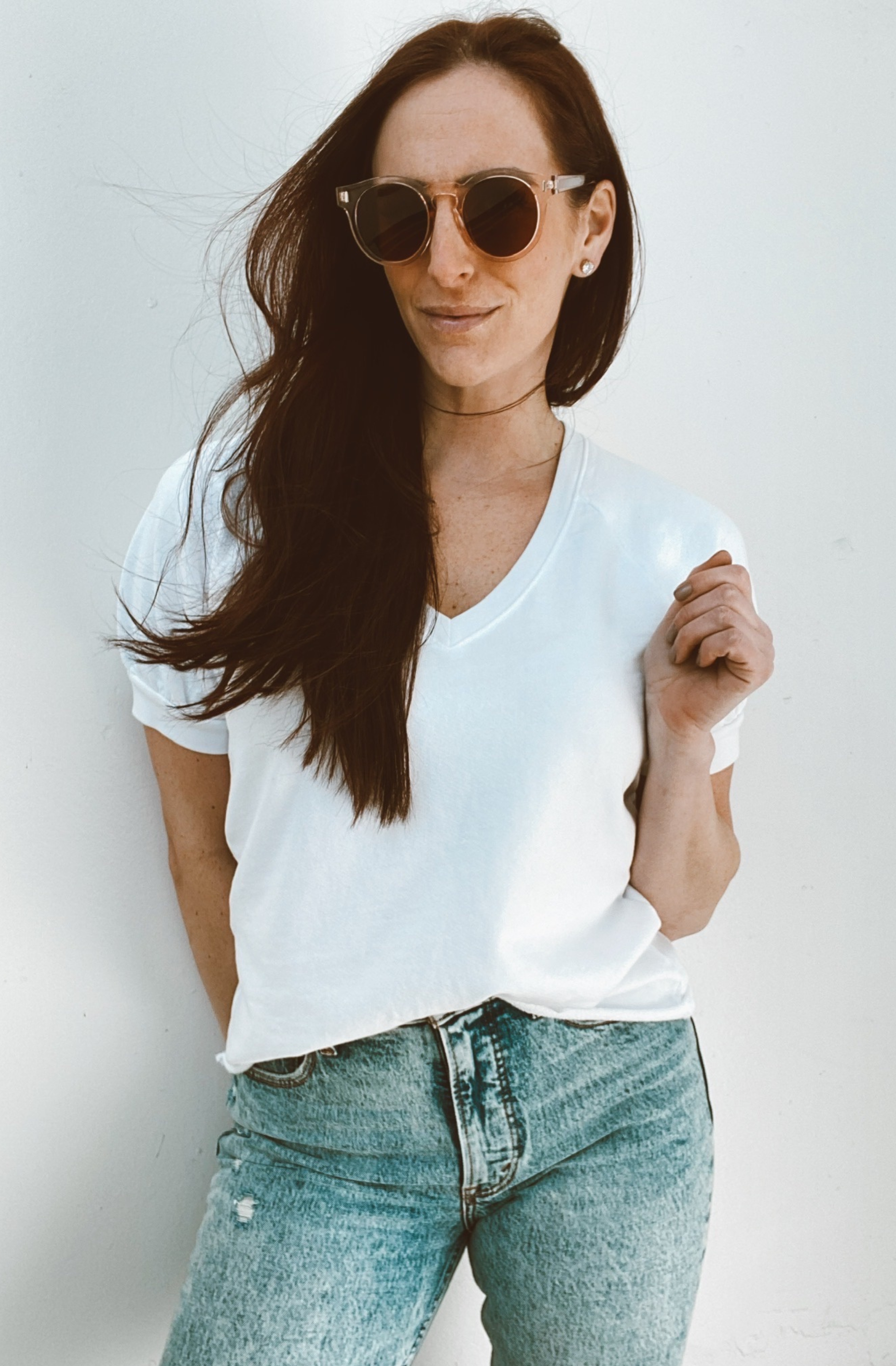 White V-neck Short Sleeve Sweatshirt in Organic Cotton Worn with Jeans 