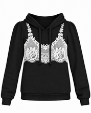 A black long-sleeve hoodie featuring a white lace bralette embroidery across the chest