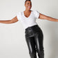 White supima cotton tulip sleeve tee, black leather pants and pointed heels on dancing model