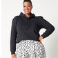 Black cotton fleece long sleeve sweatshirt on smiling model