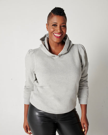 Heather grey cotton fleece long sleeve sweatshirt on smiling model