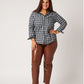 Plaid cotton long sleeve classic button down on smiling white model in brown leather pants and nude heels