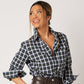 Close-up of Plaid cotton long sleeve classic button down on smiling asian model looking to side