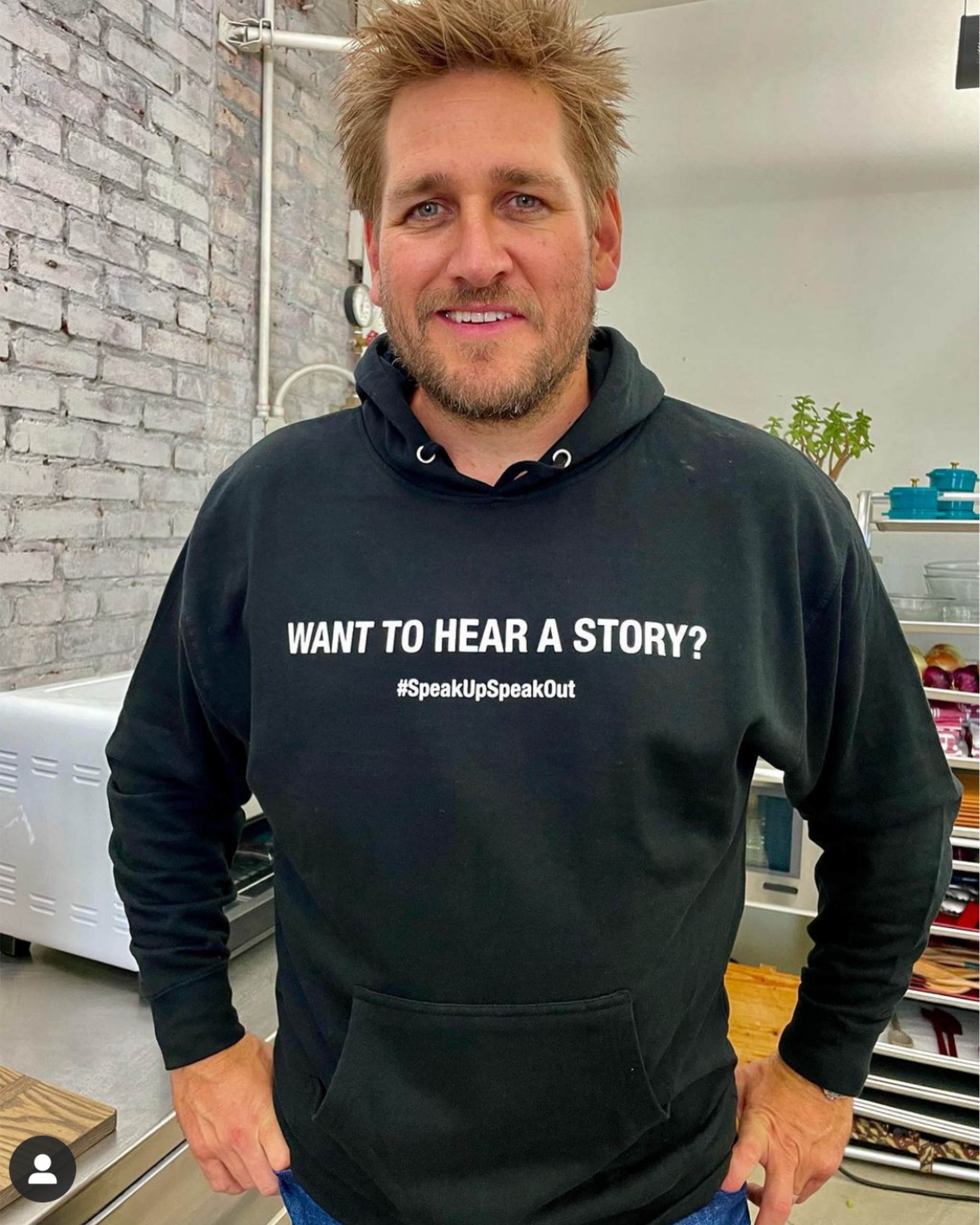 Black unisex long sleeve sweatshirt on chef Curtis Stone