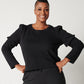 Black organic cotton, double sleeve crewneck sweatshirt on smiling black woman with hands on hips