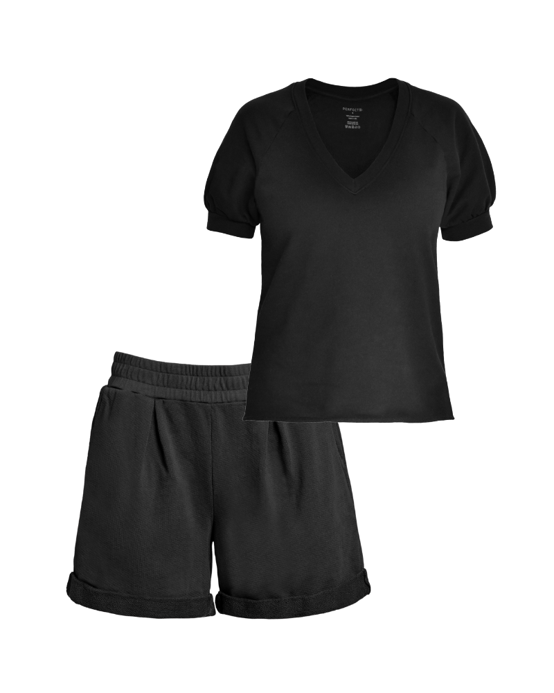 Front flat lay of black organic cotton v-neck sweatshirt and matching black cotton pleated sweat shorts