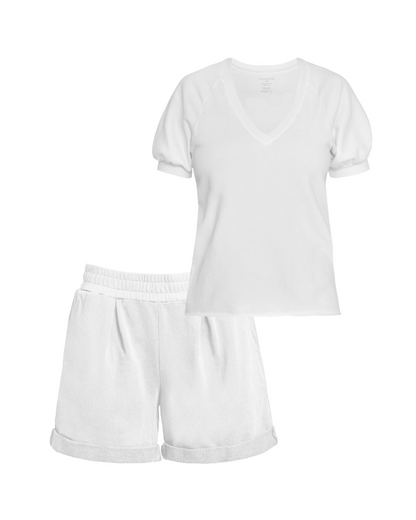 Front flat lay of white organic cotton v-neck sweatshirt and matching white cotton pleated sweat shorts