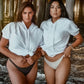 White cotton short sleeve sweatshirt on 2 models at sunset on the beach