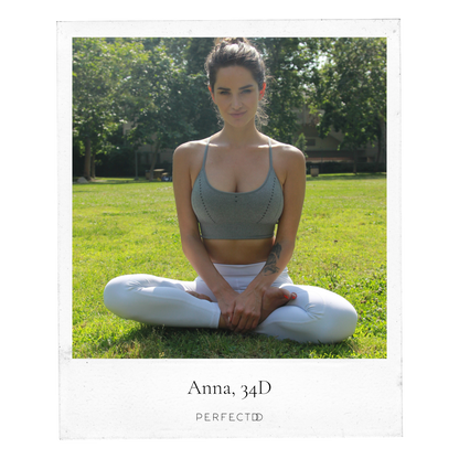 Polaroid picture of thin, brunette sitting in yoga position in sports bra and leggings