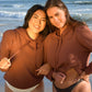 Vintage tobacco cotton fleece long sleeve sweatshirt on 2 models at the beach
