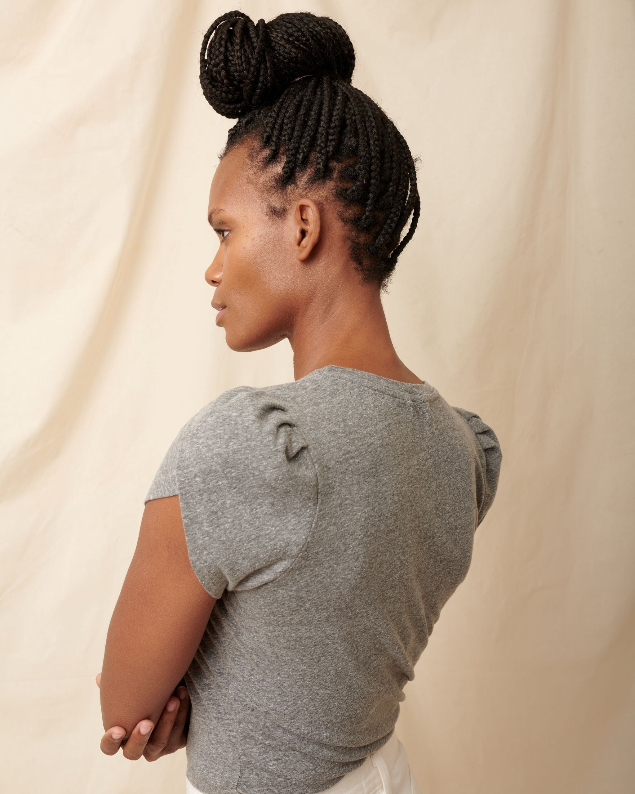 Side profile detail of Heather grey supima cotton scoopneck tulip sleeve tee