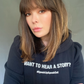 Actress Lindsay Price wearing black cotton fleece puff sleeve sweatshirt