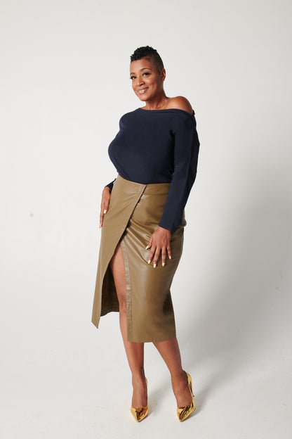 Dark navy supima cotton off-the-shoulder tshirt on black model wearing tan leather skirt and gold heels