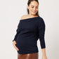 Pregnant model wearing dark navy supima cotton off-the-shoulder tshirt