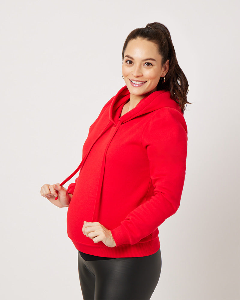 Varsity Red cotton fleece long sleeve sweatshirt on pregnant model smiling
