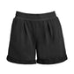 Front flat lay of black organic cotton pleated sweat shorts